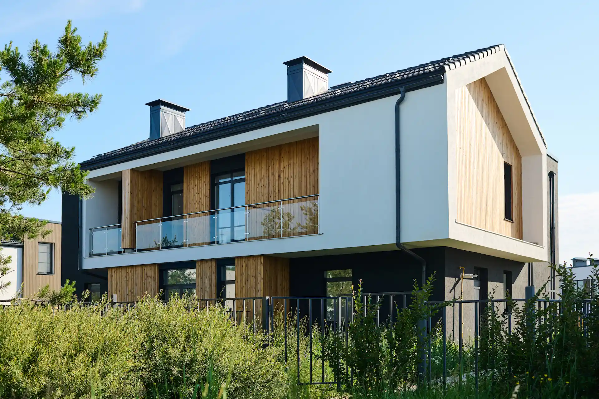 two-storey-cottage-with-balcony-and-group-of-windo-2023-11-27-05-09-38-utc-1.webp