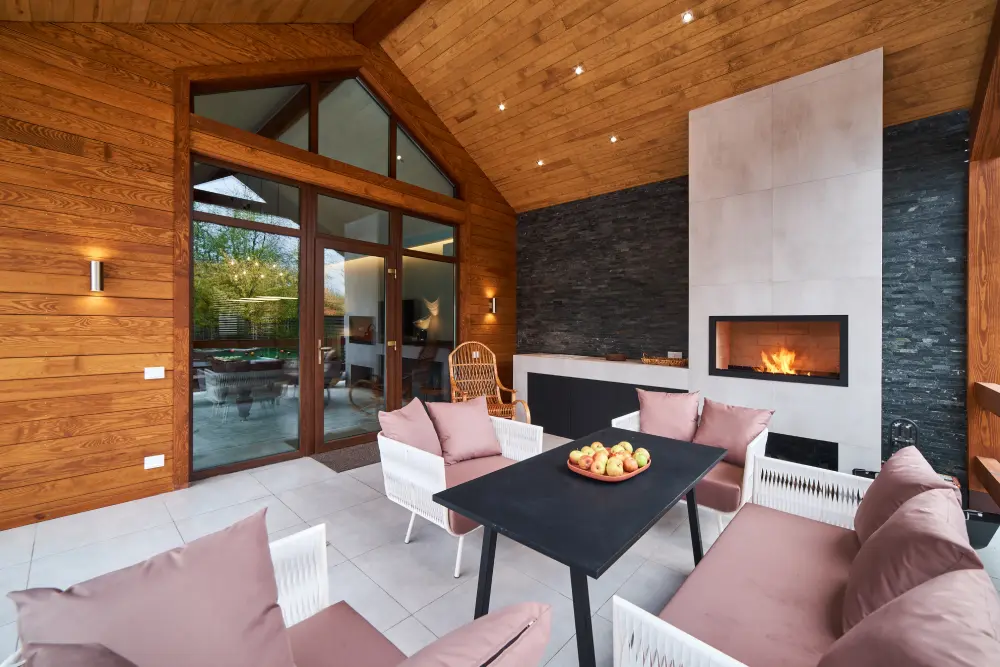 an-open-terrace-with-table-chairs-fireplace-and-2025-03-15-08-48-23-utc.webp