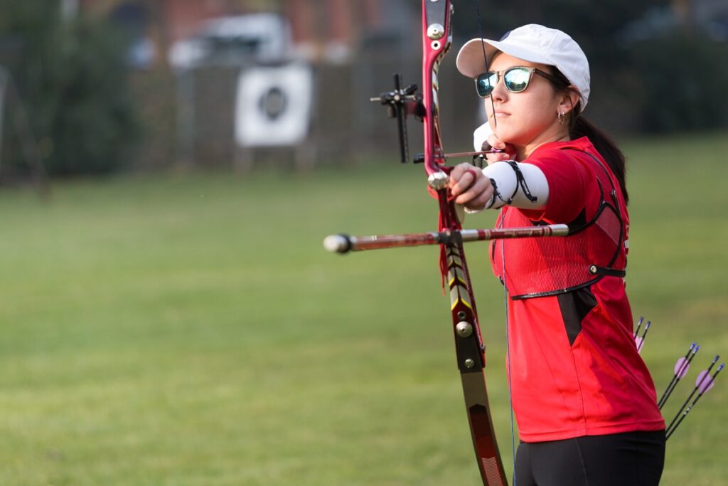 female-athlete-practicing-archery-in-stadium-2024-09-13-13-36-13-utc.jpg
